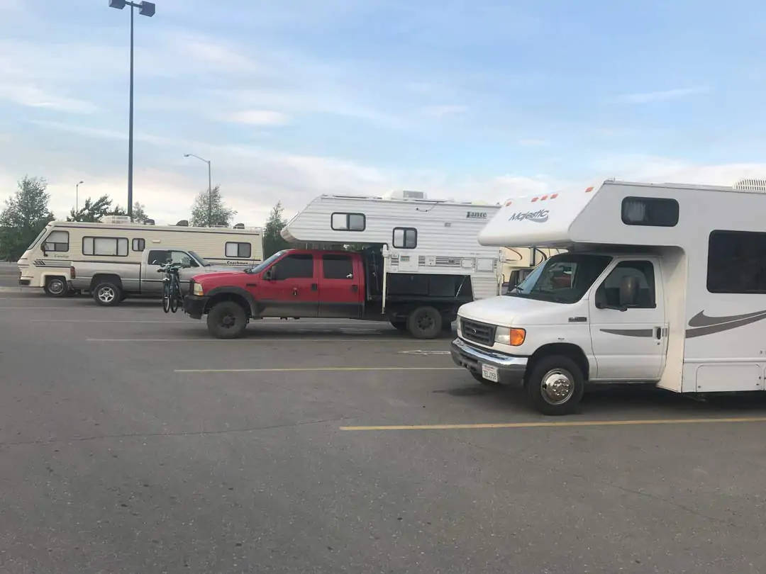three campers parked at walmart