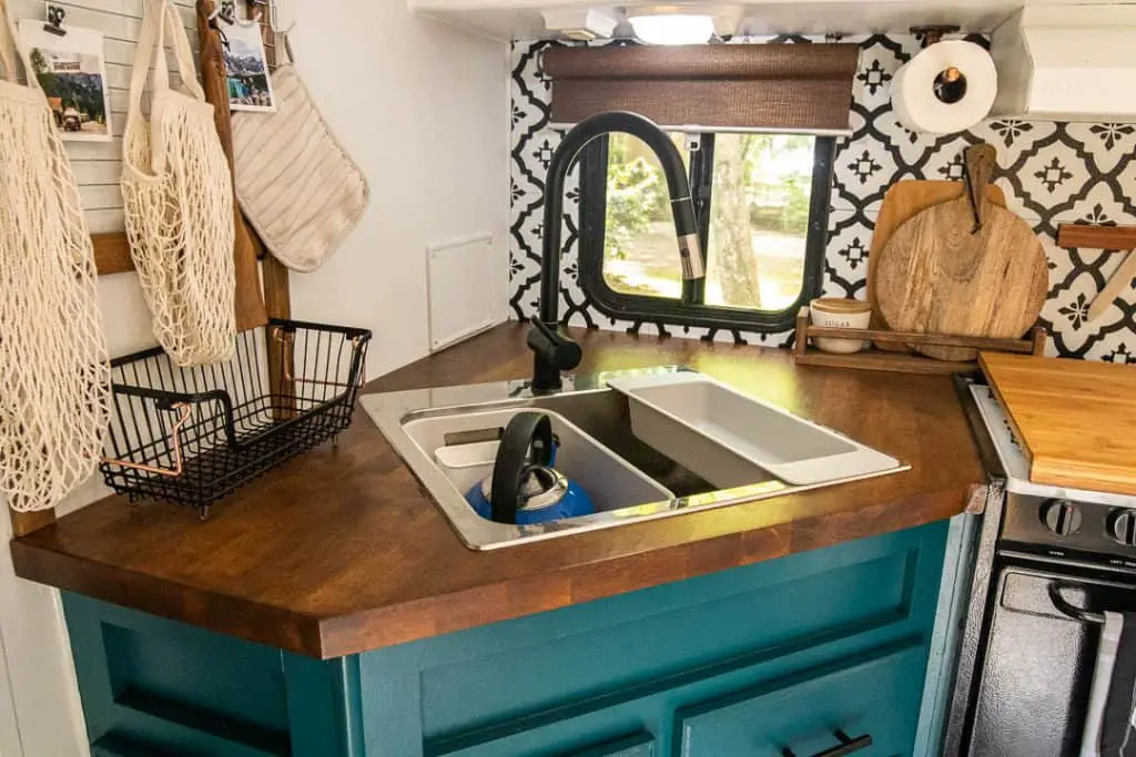 Dark Brown Butcher Block Countertop in a RV Kitchen